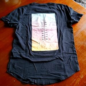 Hollister- XS black T w/ pastel-like color printed logo front/back. A4.
